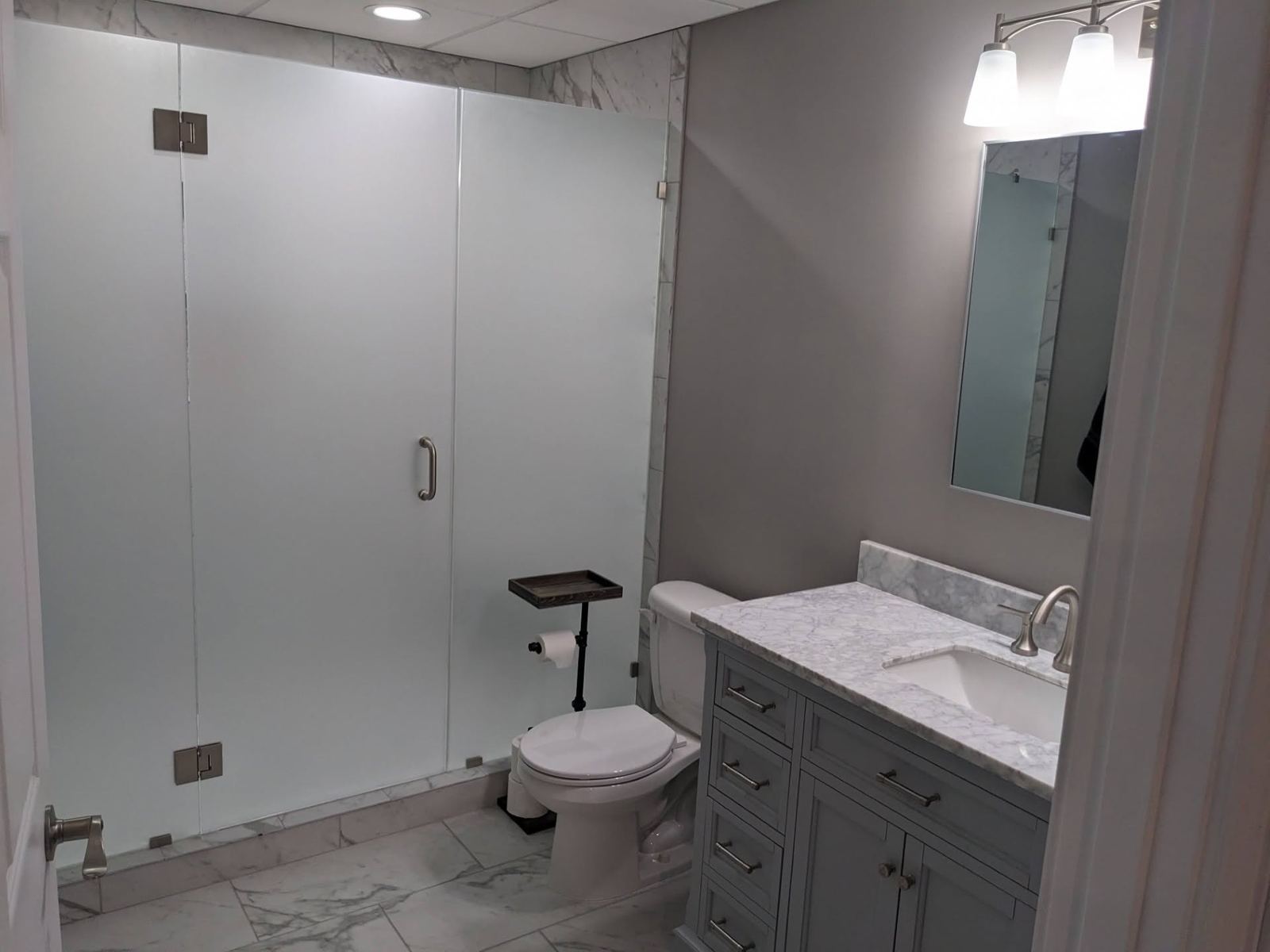 Frosted glass shower gray vanity Davenport IA
