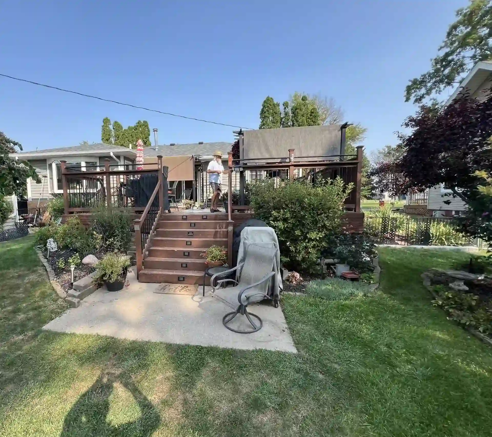 backyard deck with steps and patio in Davenport, Iowa