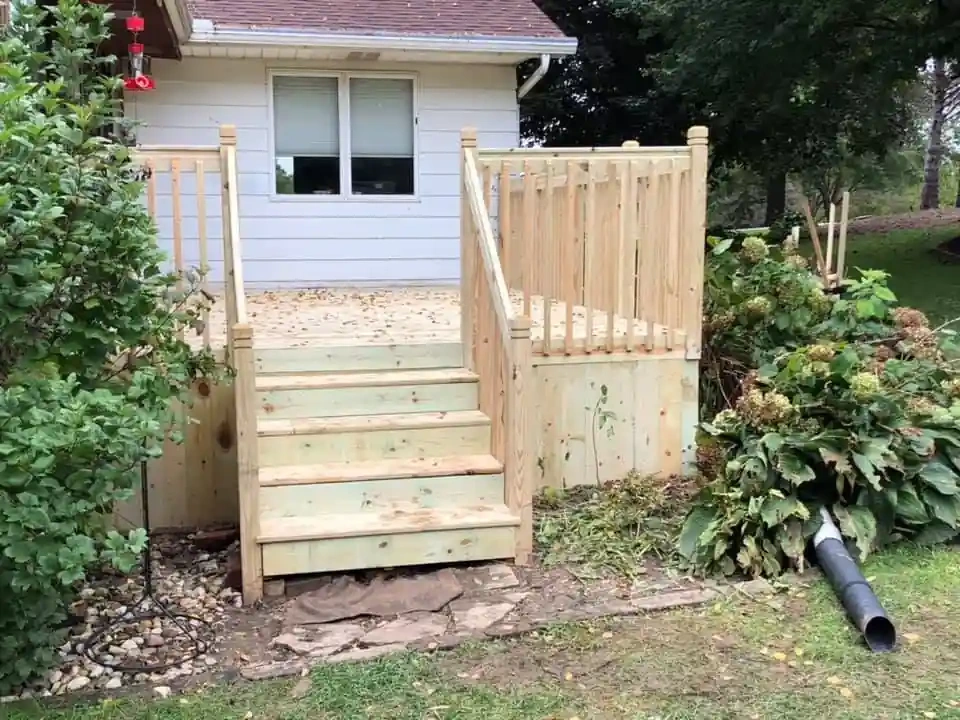 small porch deck with privacy fence in Davenport, Iowa