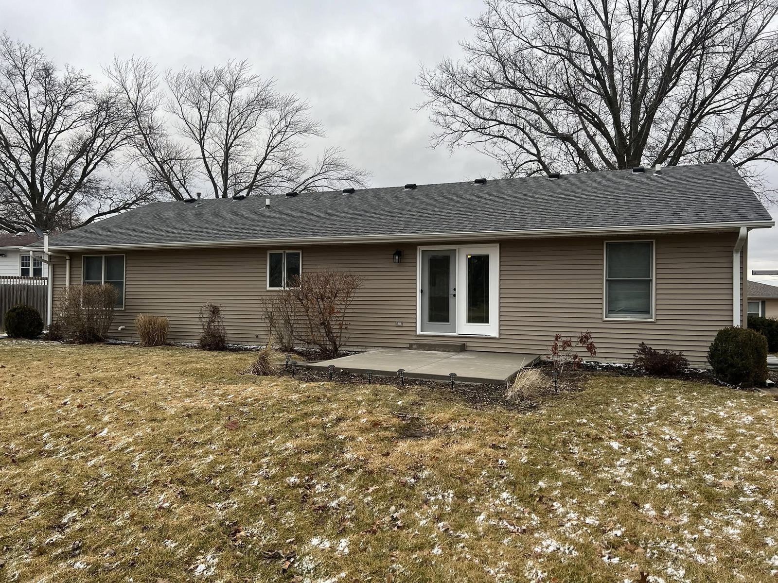 Tan ranch home front exterior in Davenport, Iowa