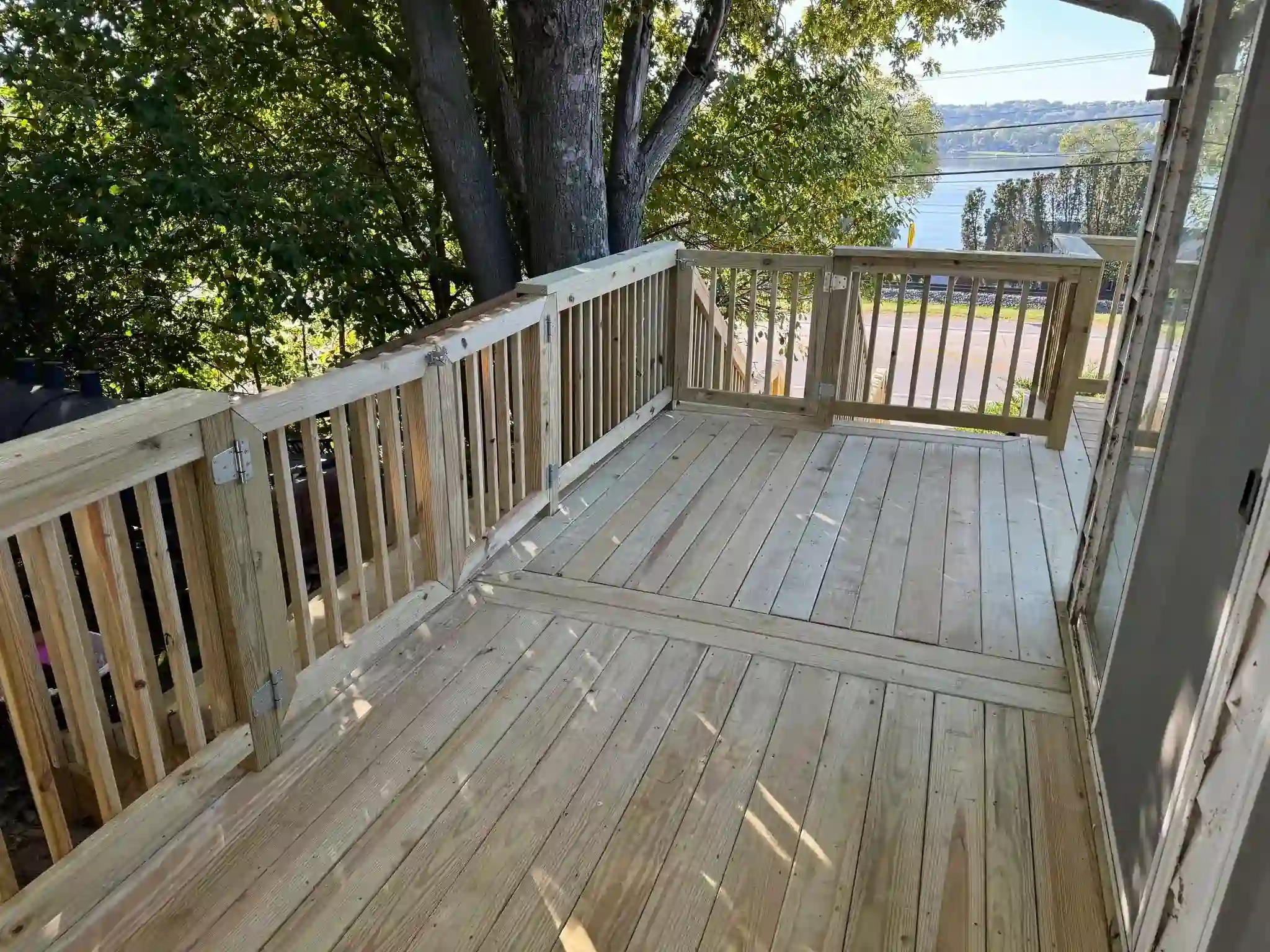 wood deck overlooking a backyard in Davenport, Iowa