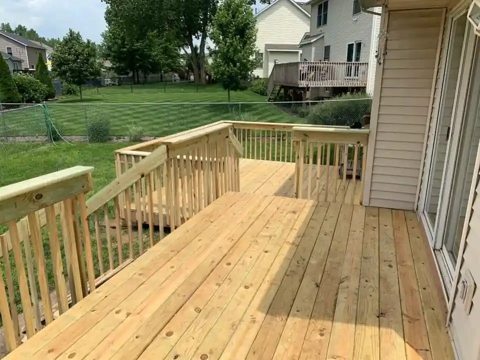 wood deck with railing in the Quad Cities