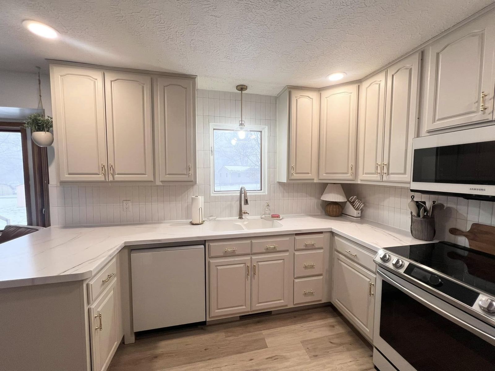 Light wood U-shaped kitchen Davenport IA