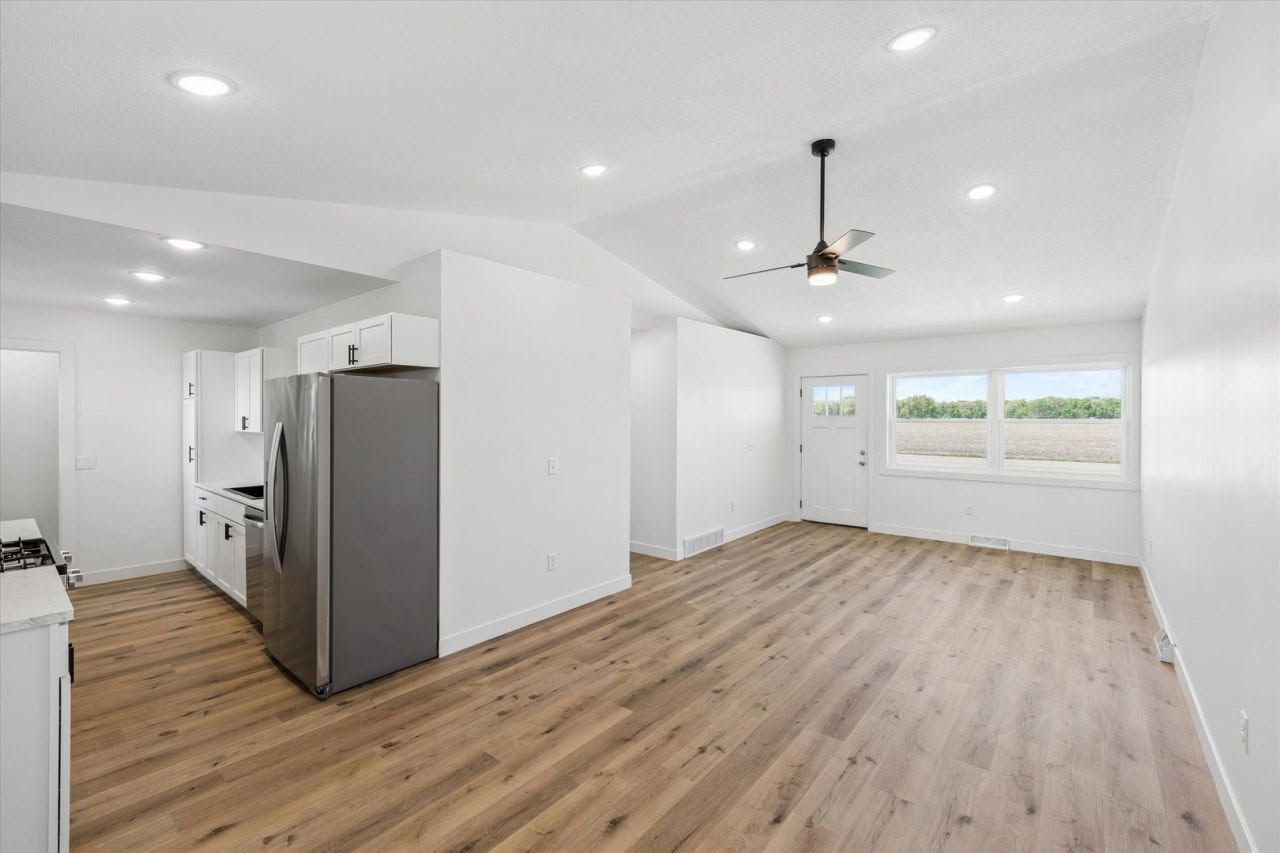 Open plan interior light wood floor Davenport IA