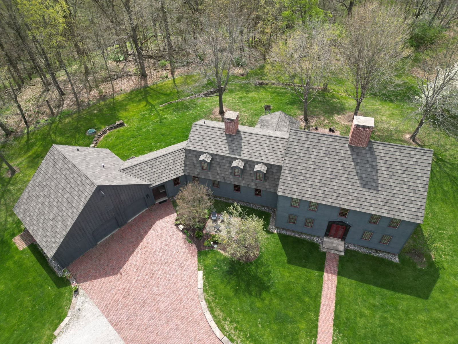 Multi gable shingle roof aerial view